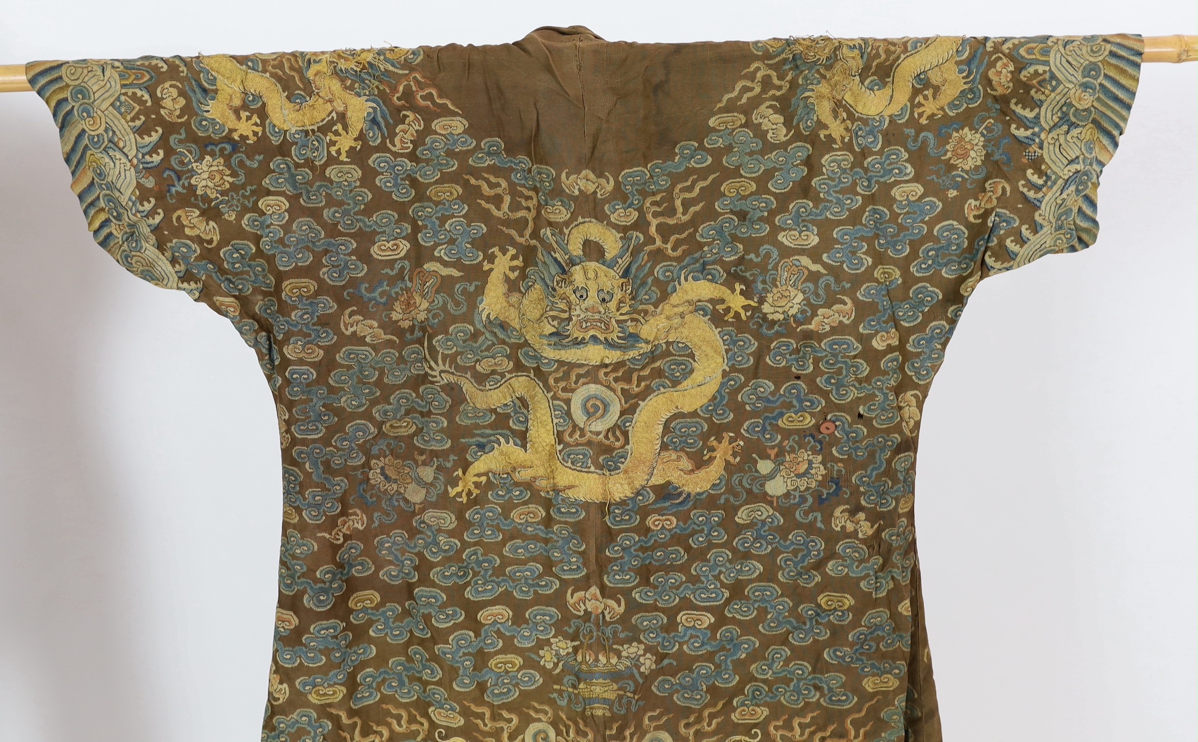 A Chinese embroidered silk and kesi gauze ’dragon’ summer robe, late Qing dynasty, some alterations and unpicked threads